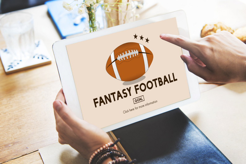 Fantasy football customer using a tablet.